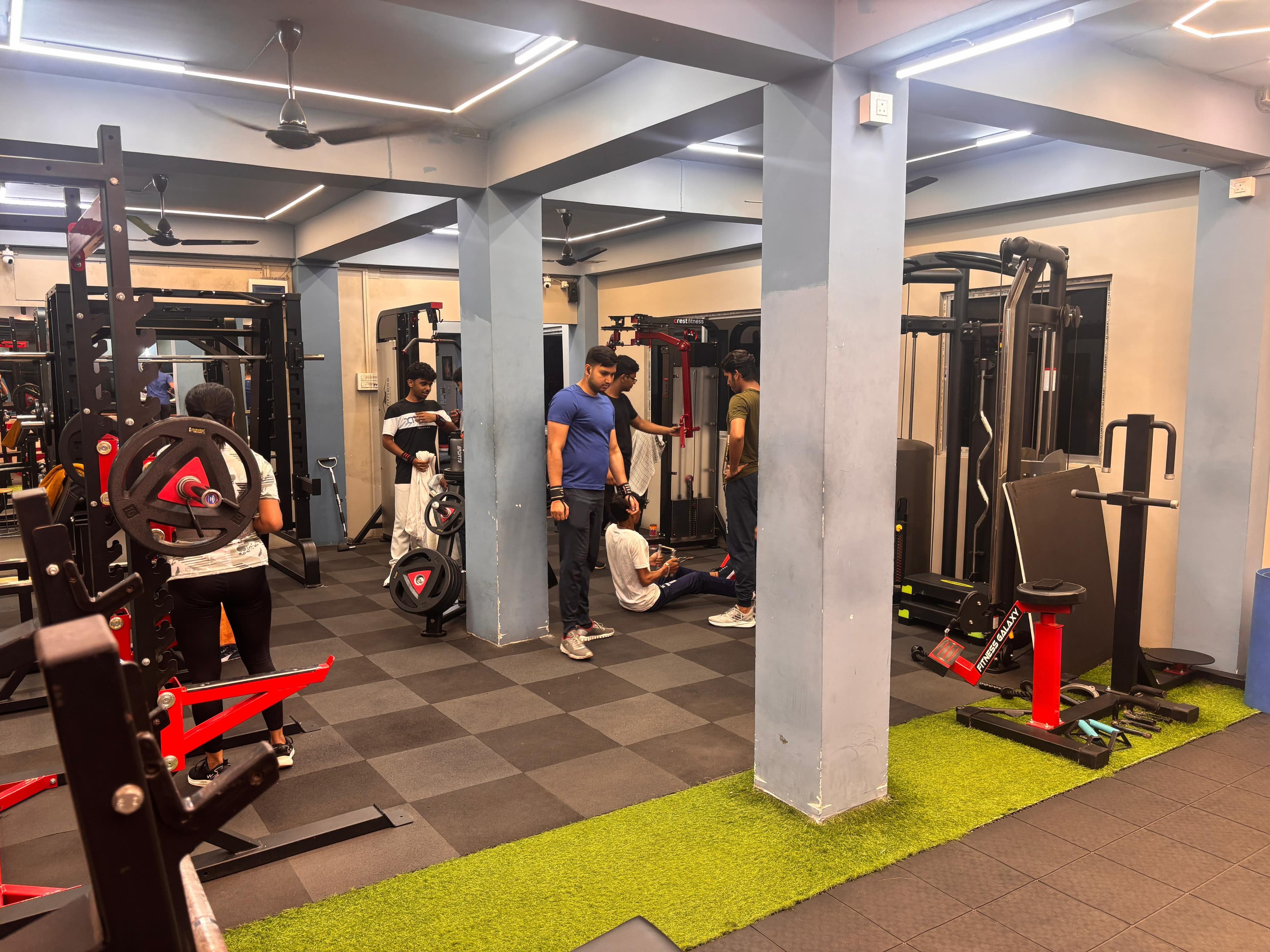 Clean equipment at Samz Fitness Hub, Siliguri